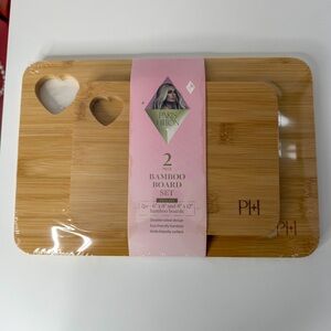 Paris Hilton Bamboo Cutting Board Set with Heart Cutouts.